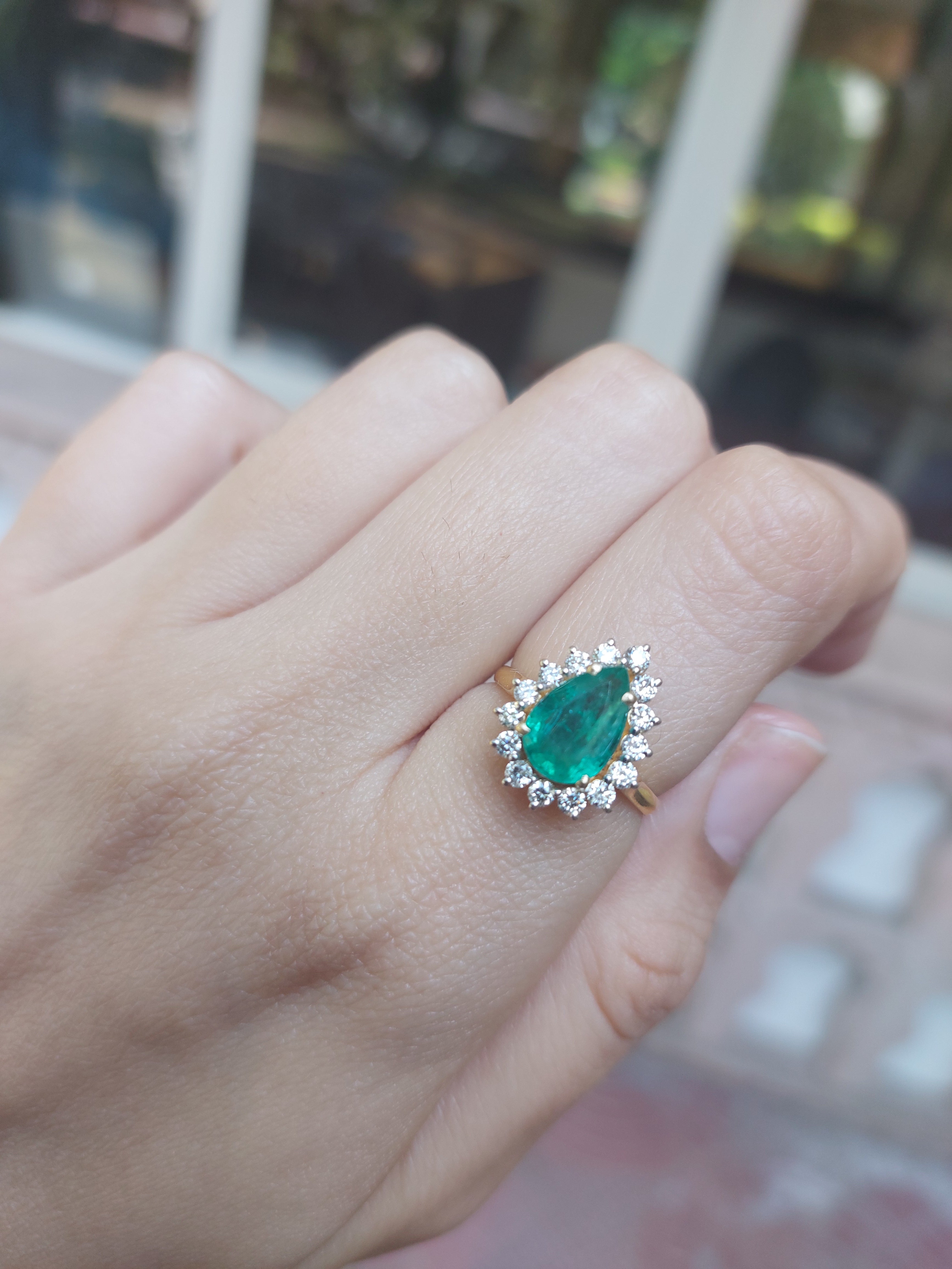 Emerald Ring with Diamond Halo
