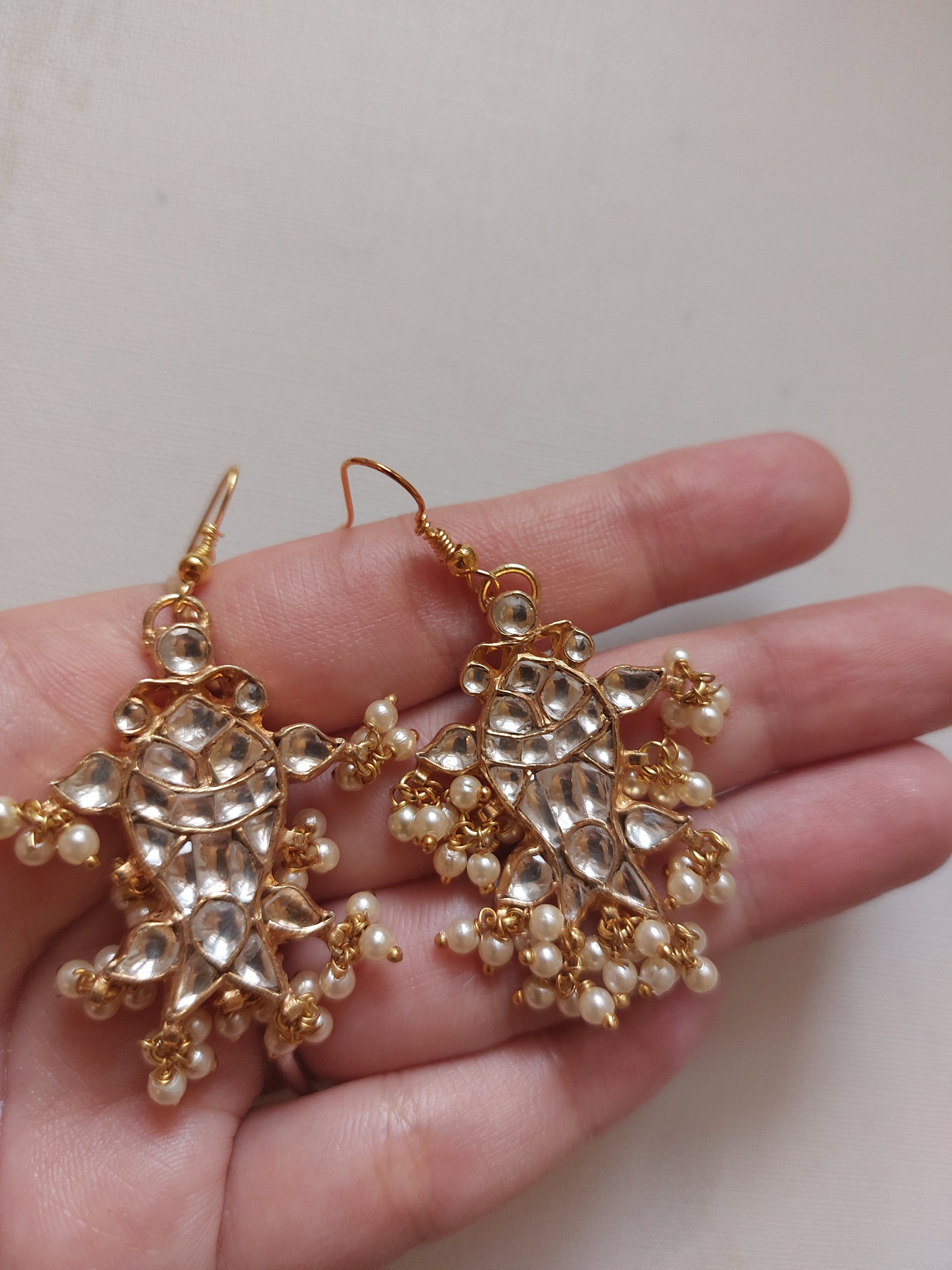 Gold plated kundan fish earrings with freshwater pearls