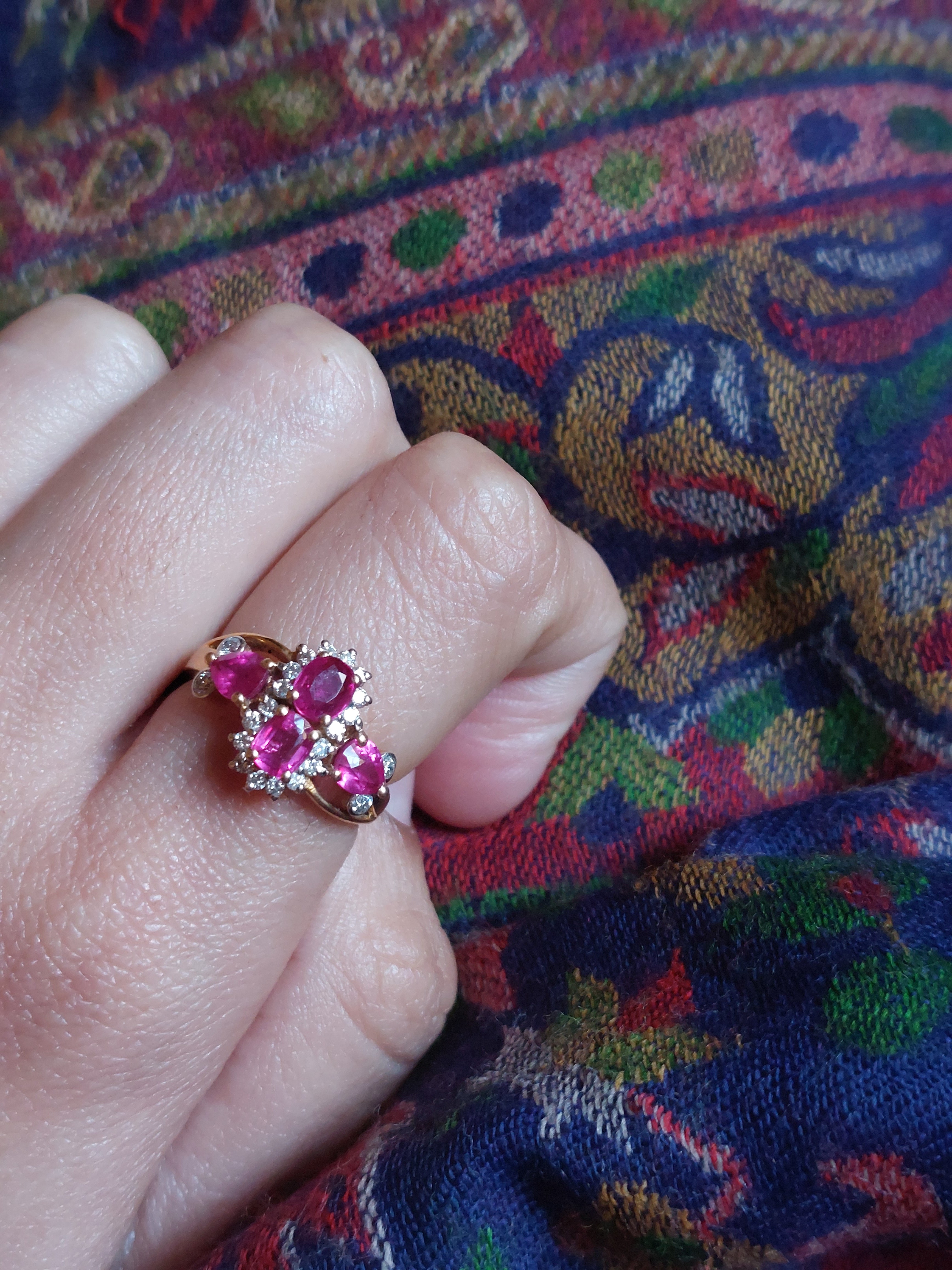 14K gold ruby ring with floral cluster design and diamond accents