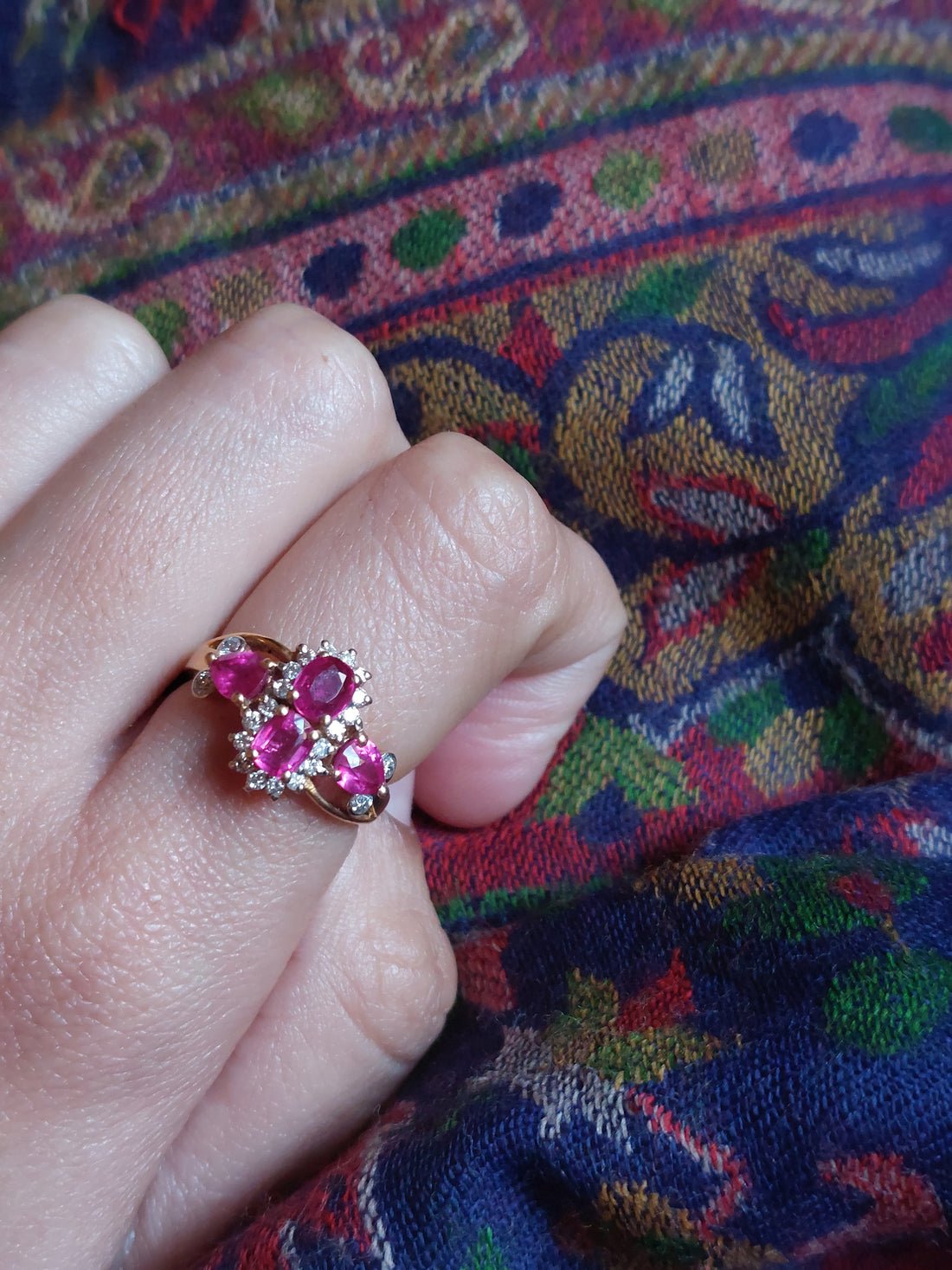 14K gold ruby ring with floral cluster design and diamond accents