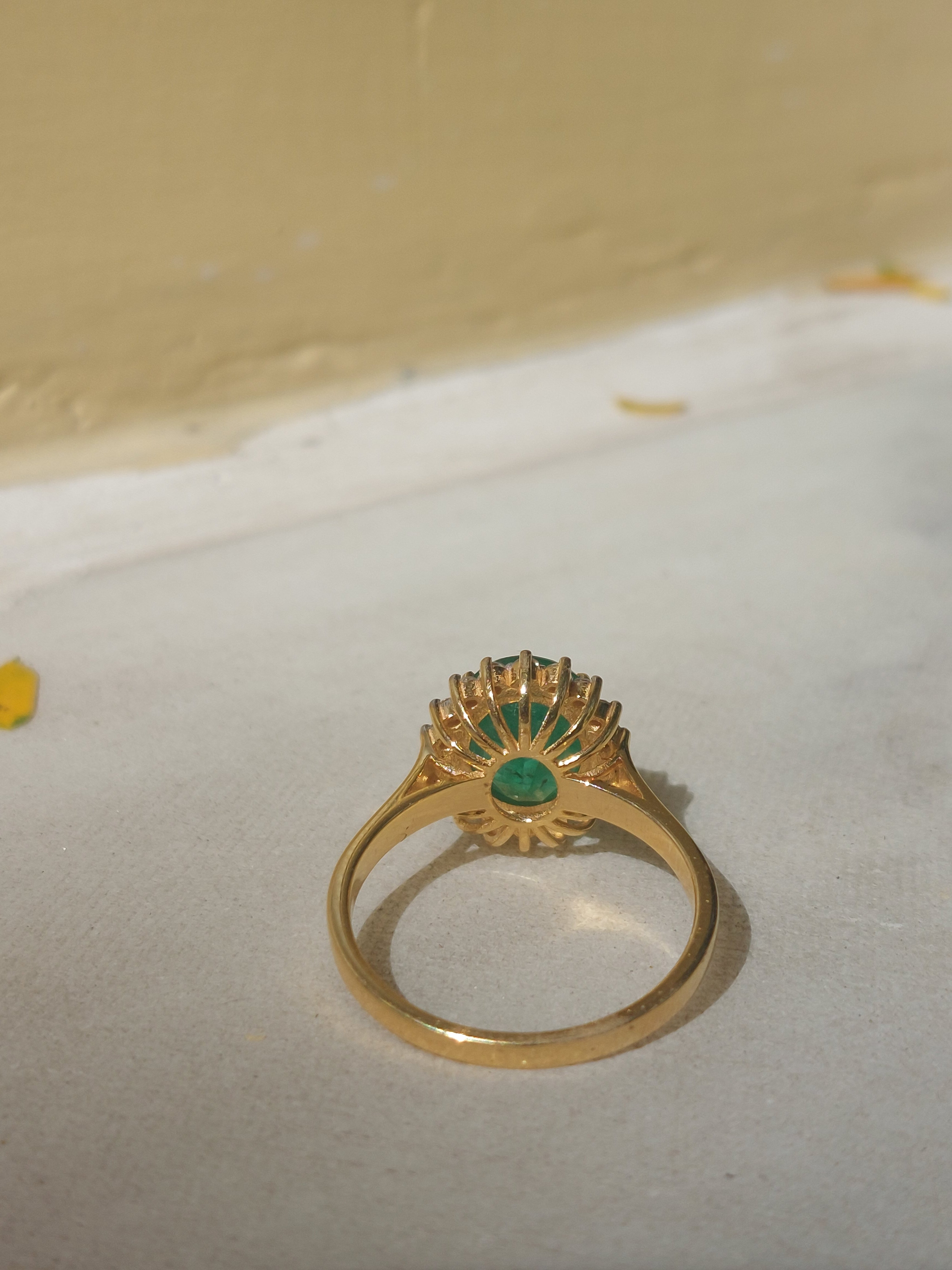 14K gold Nusrat Ring emerald with radiant gold spokes, US size 6
