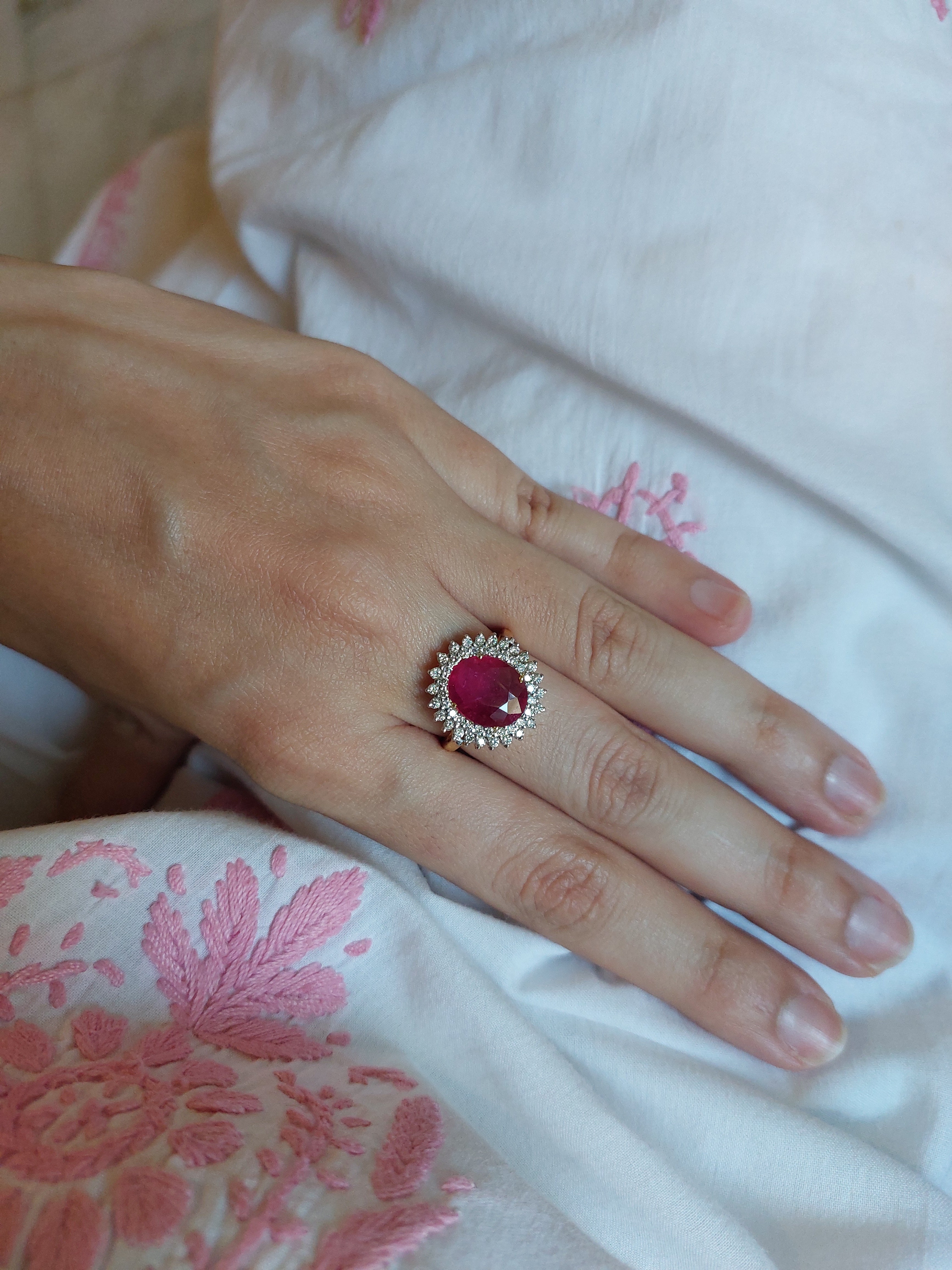 14K gold ruby ring with diamond accents close-up