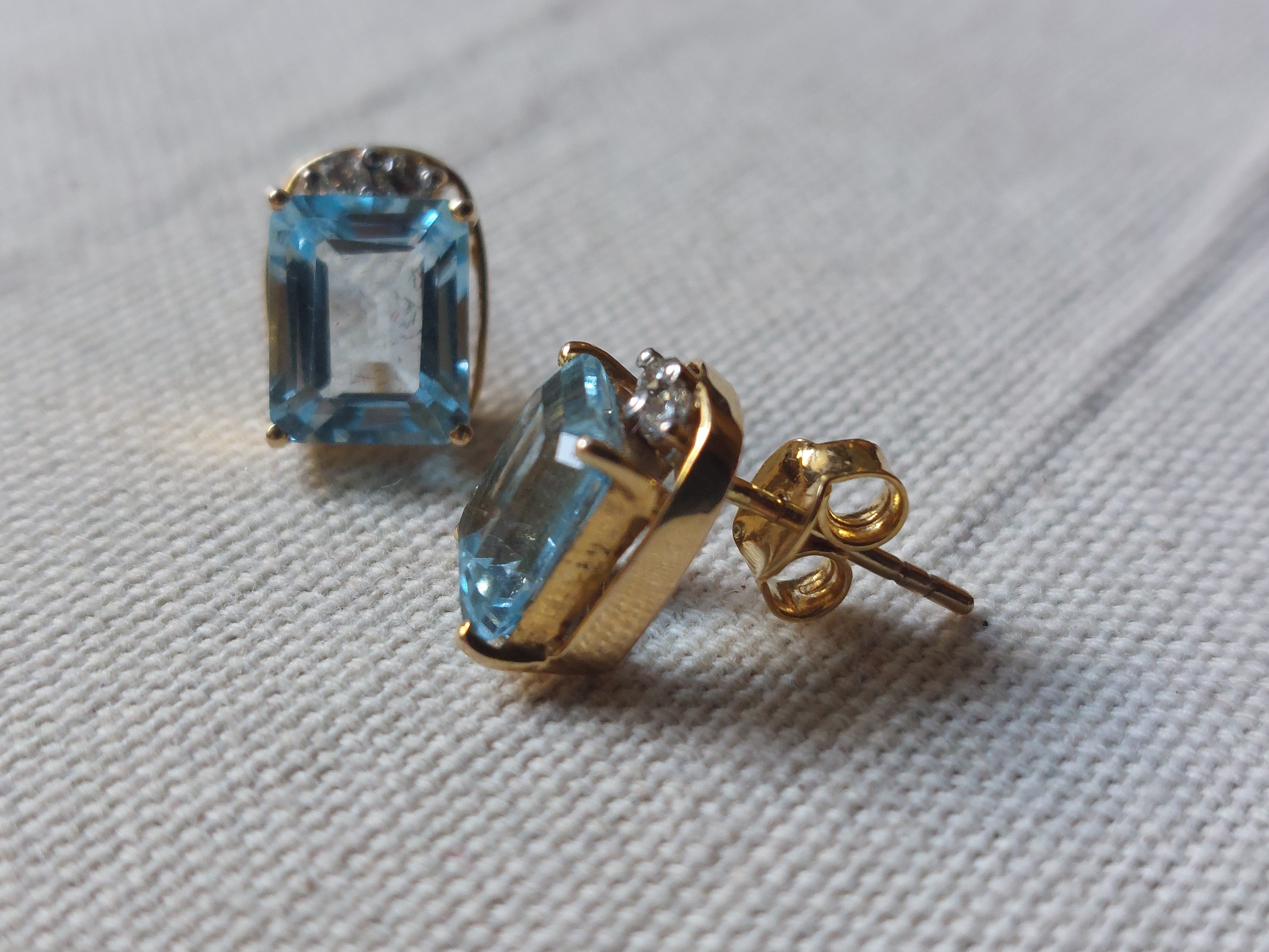 14K gold faceted blue topaz stud earrings prong setting