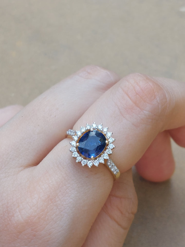 14K gold Nilofar Ring with untreated blue sapphire and diamond filigree