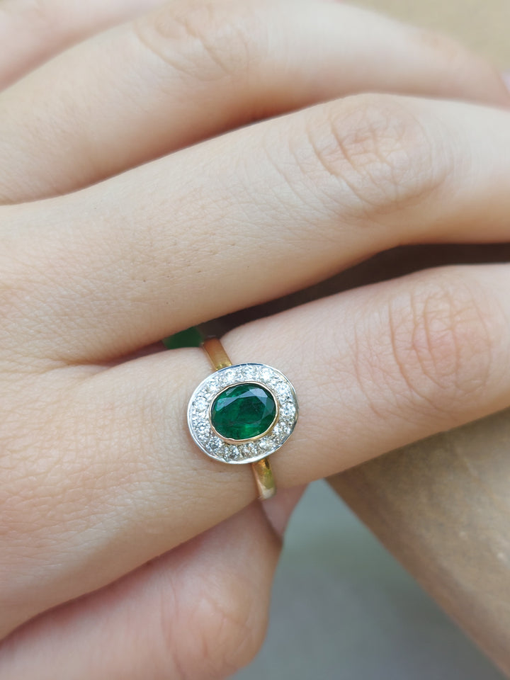 14K gold Salma Ring with oval emerald and diamond halo