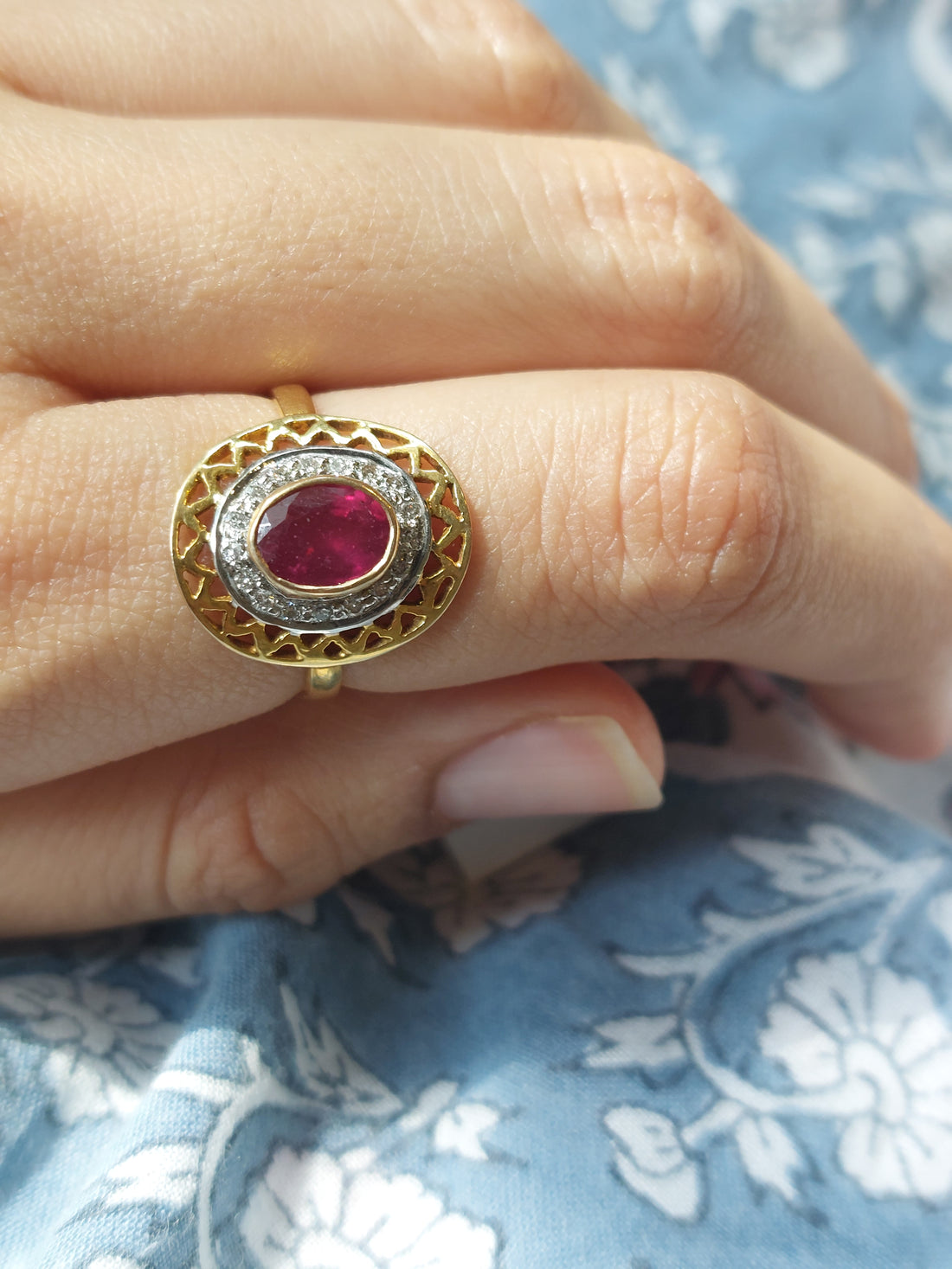 14K gold ruby ring cutout design close-up