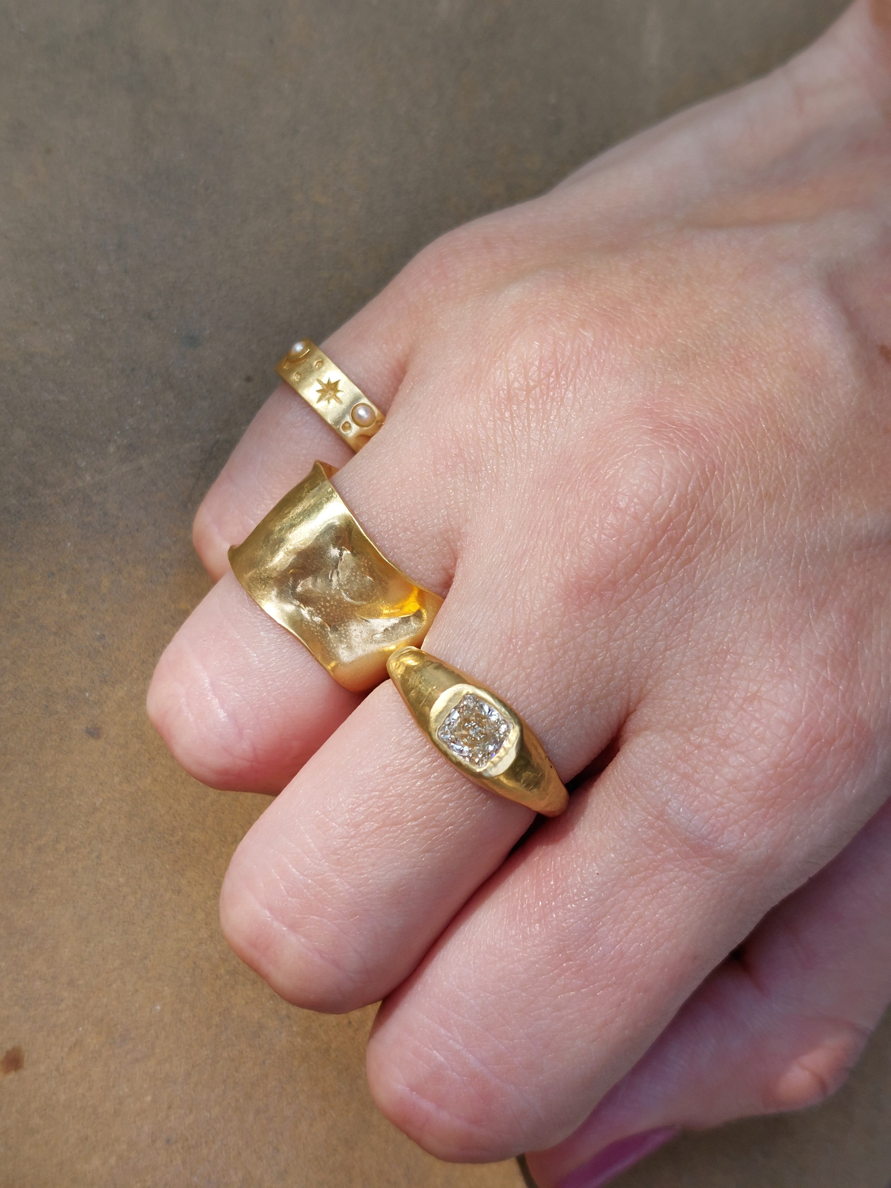 22K gold cushion cut diamond ring close-up detail