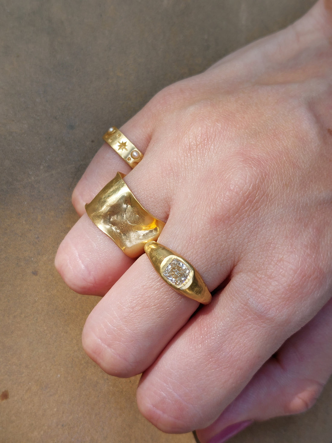 22K gold cushion cut diamond ring close-up detail