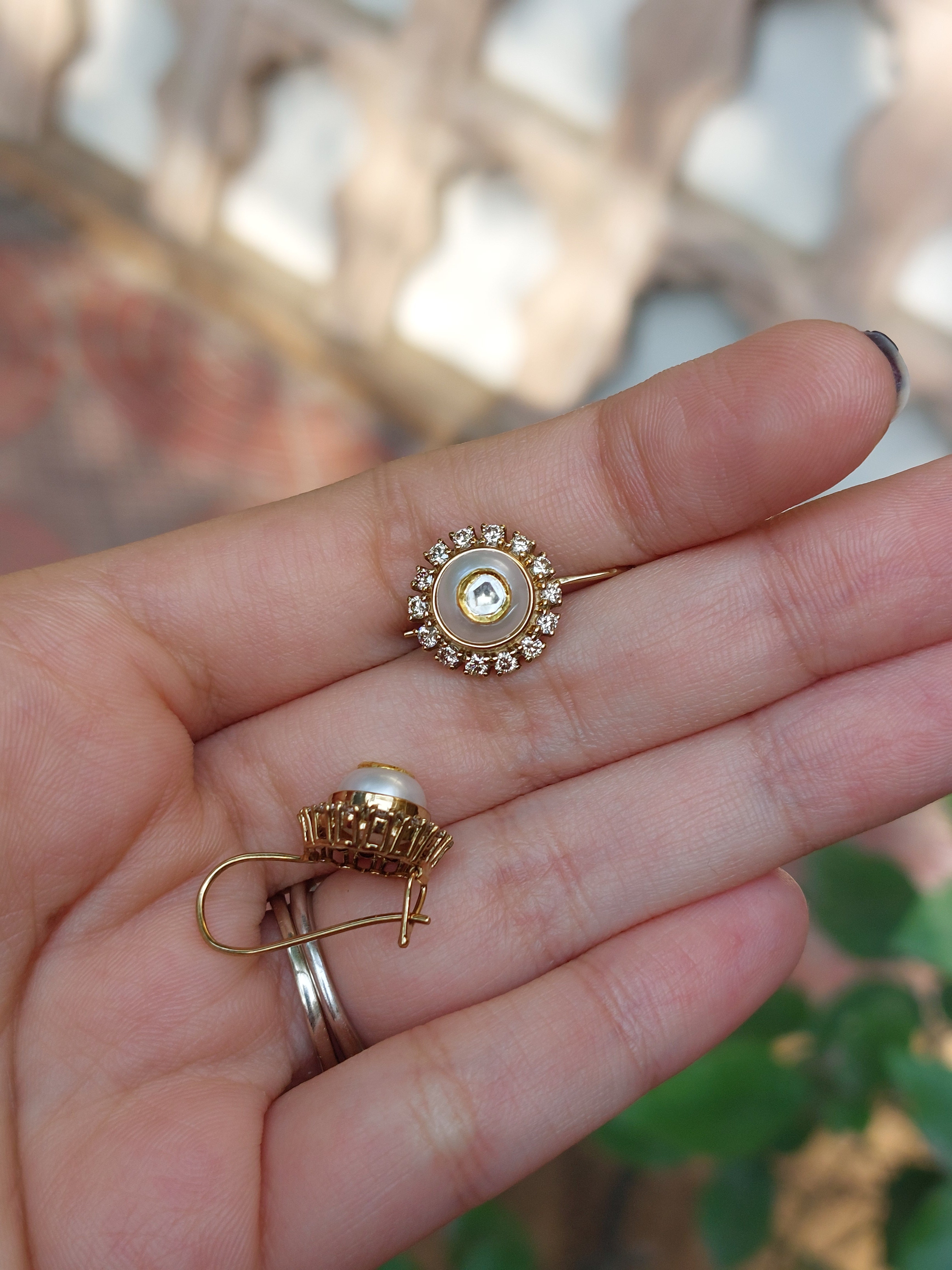 Gold pearl diamond polki earrings close-up detail