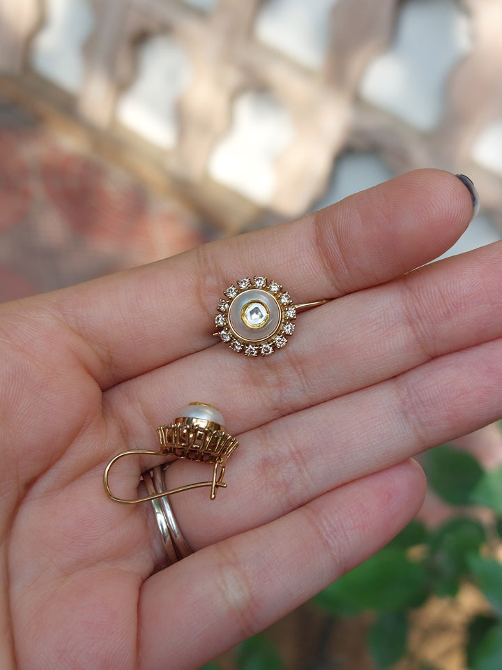 Gold pearl diamond polki earrings close-up detail