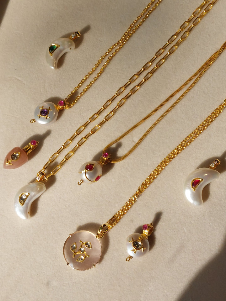 22K gold pearl ruby polki pendant close-up
