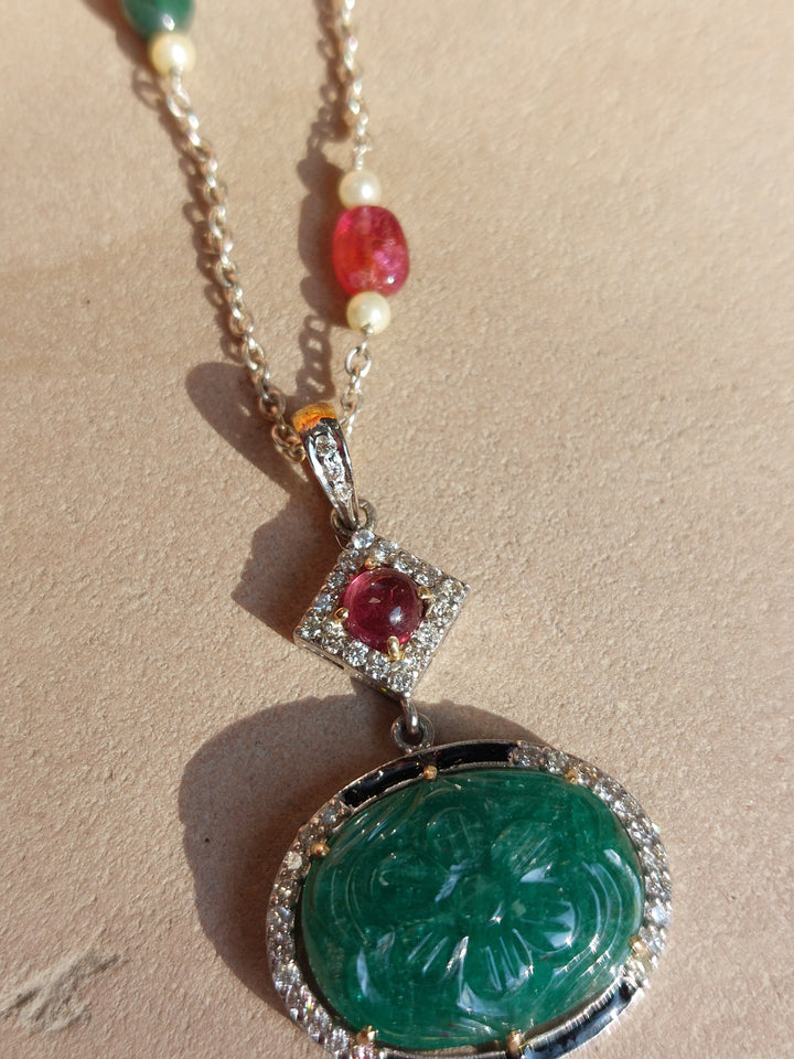 Gold emerald tourmaline pendant mala close-up detail