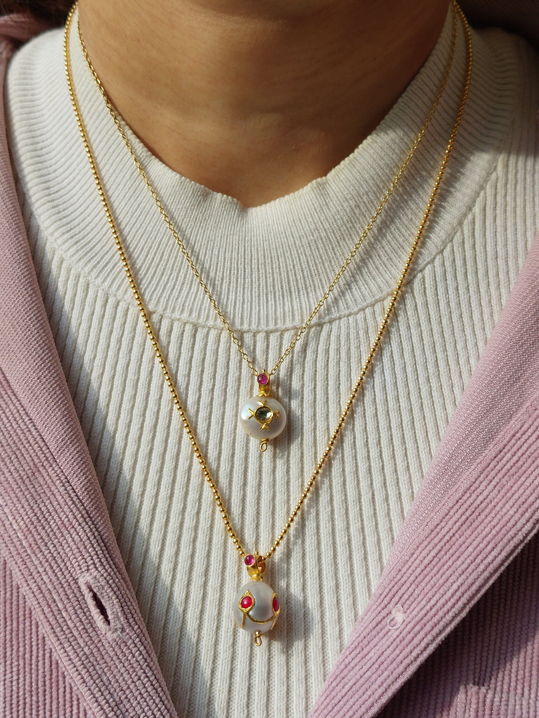 22K gold ruby South Sea pearl pendant close-up