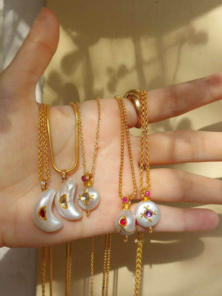 22K gold pearl amethyst pendant close-up detail