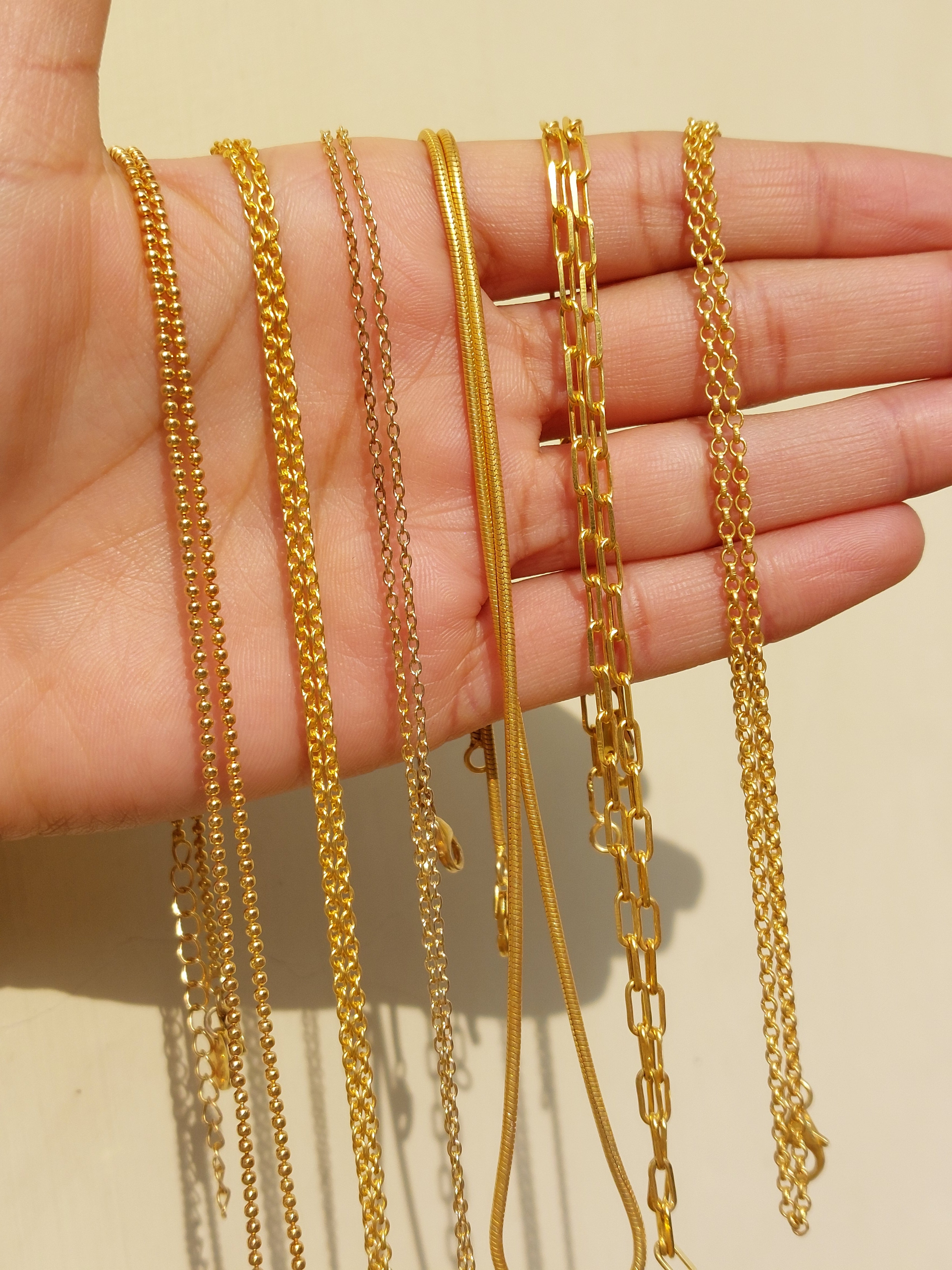 Gold pearl diamond pendant close-up detail