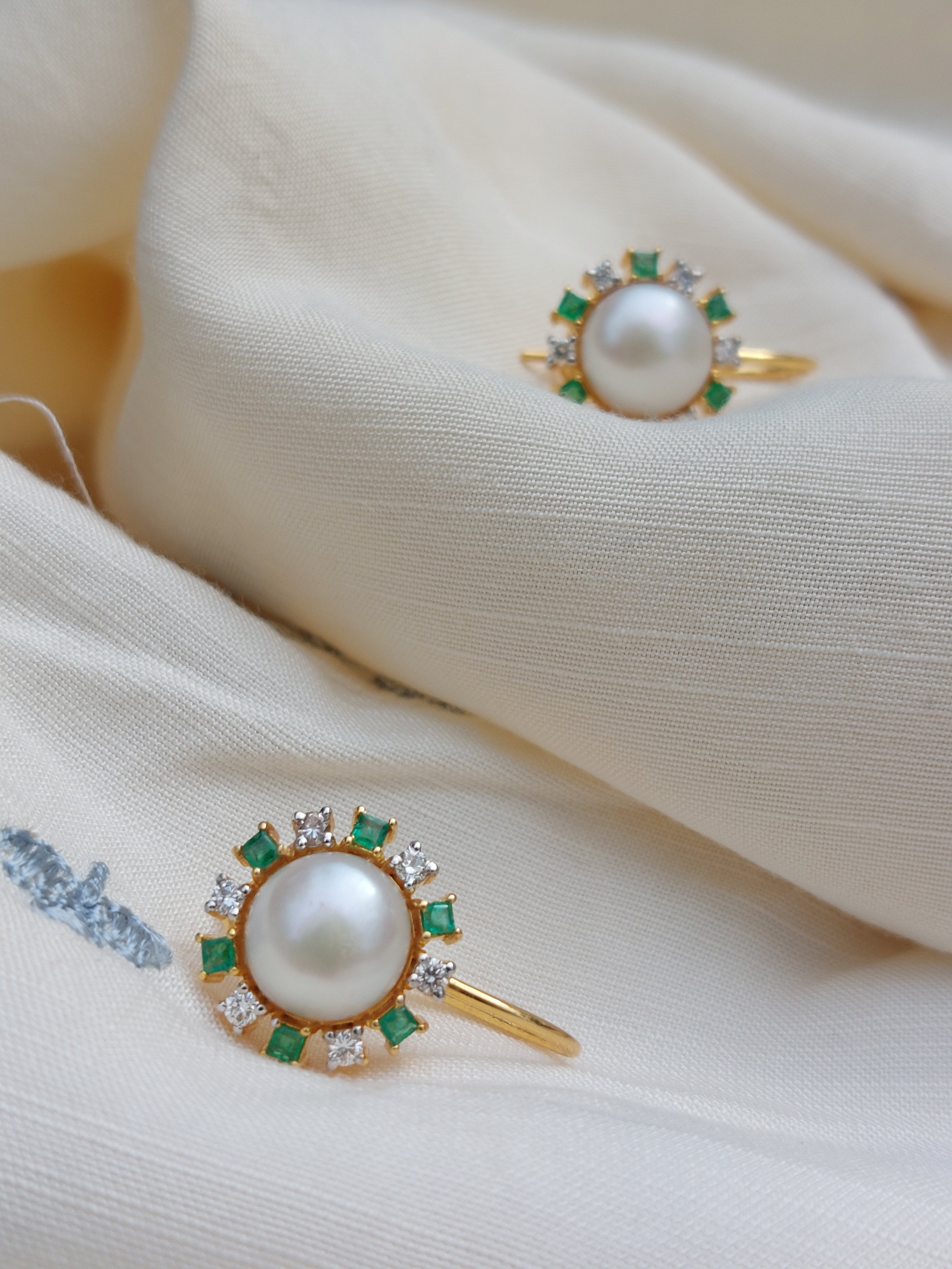 14K gold emerald pearl drop earrings close-up detail