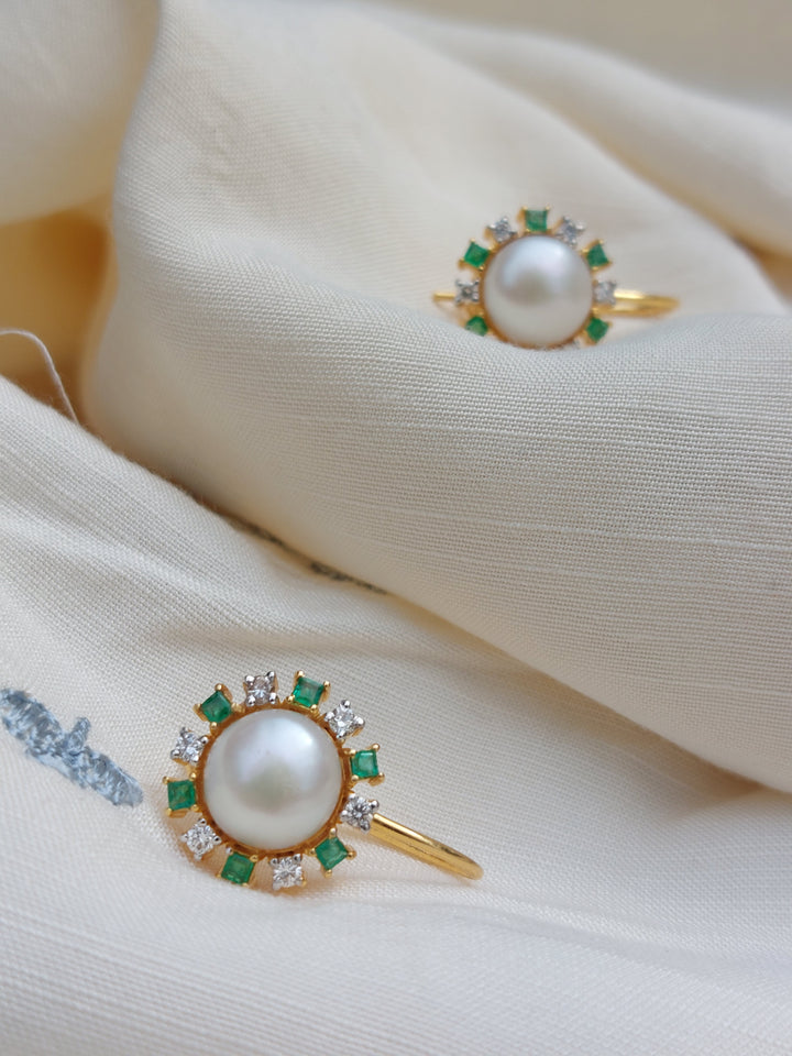 14K gold emerald pearl drop earrings close-up detail