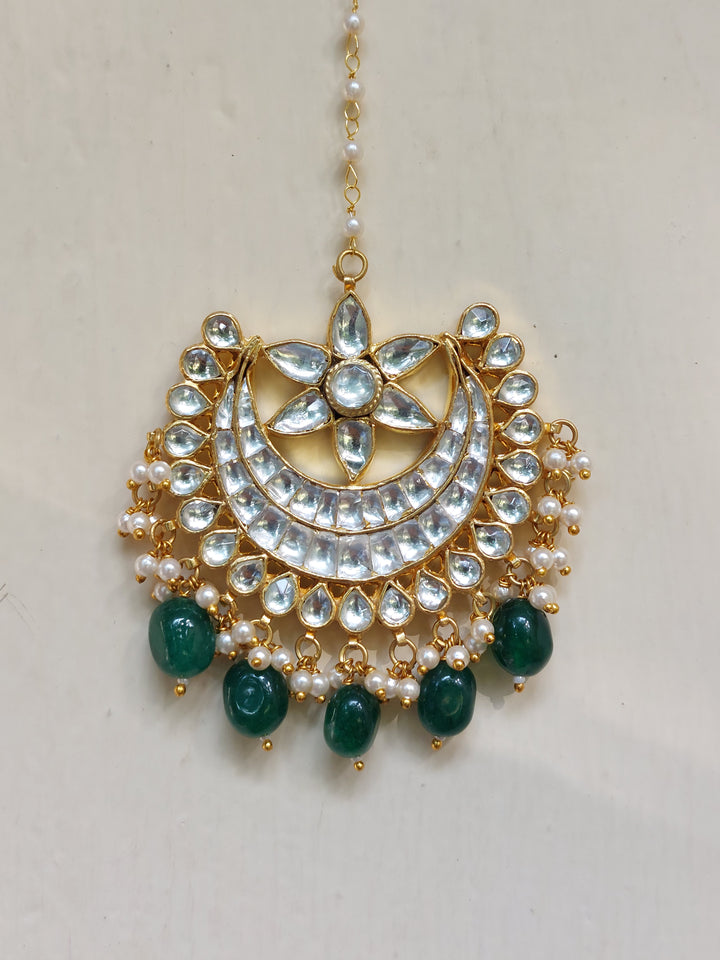Silver alloy kundan and emerald tika product photo