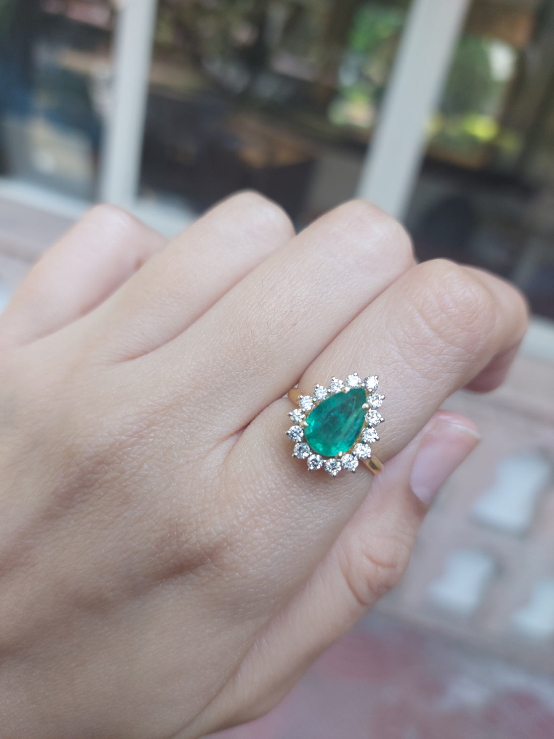 Emerald diamond halo ring product photo