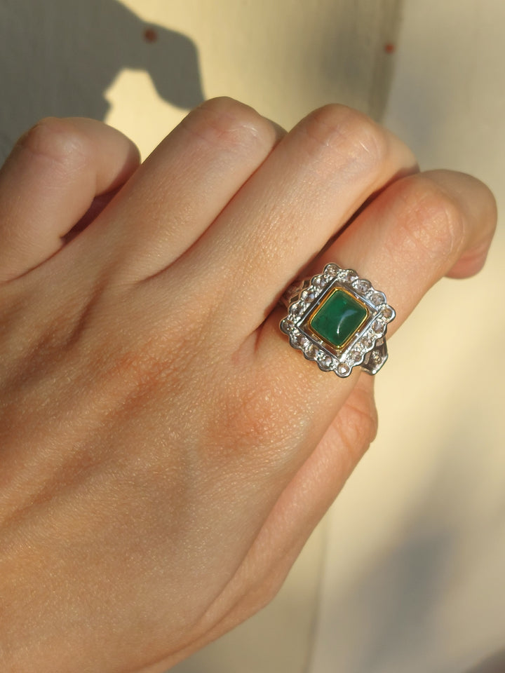 14K gold square-cut emerald halo ring with scalloped diamond border