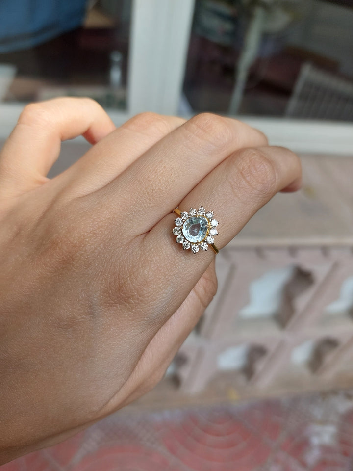 14K gold aquamarine and diamond halo ring product photo