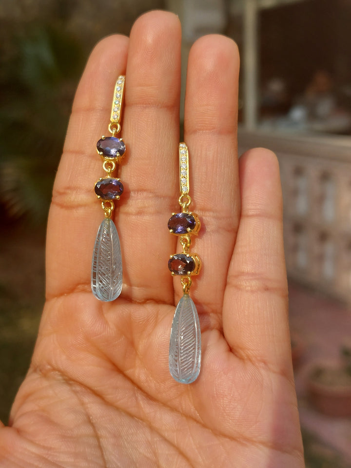 Iolite blue topaz moissanite drop earrings close-up detail