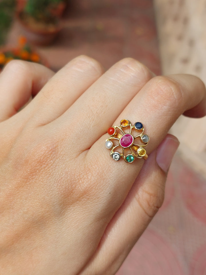 Navaratna diamond ring close-up multi-gemstone detail