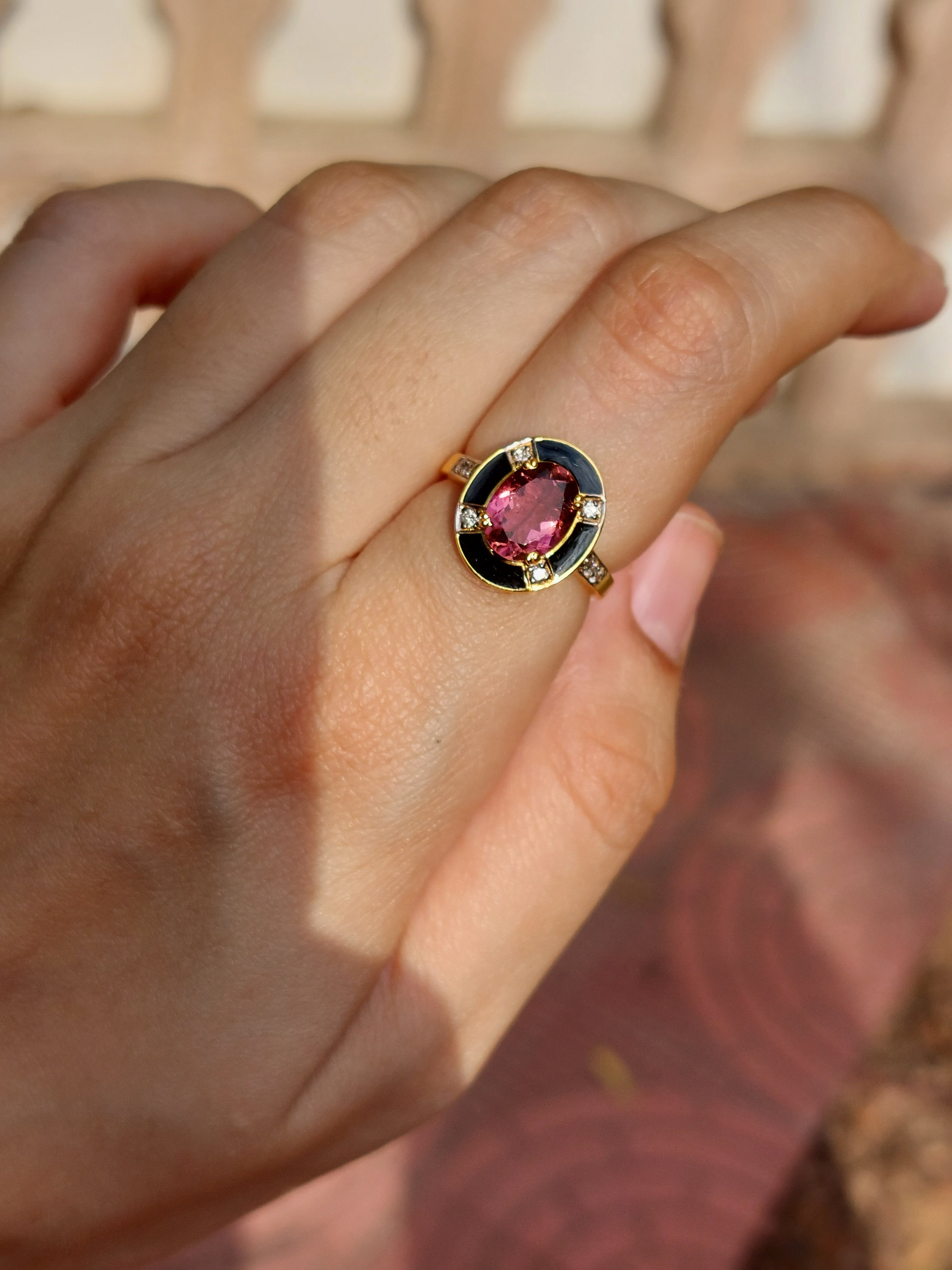 Enamel halo aquamarine tourmaline ring close-up detail