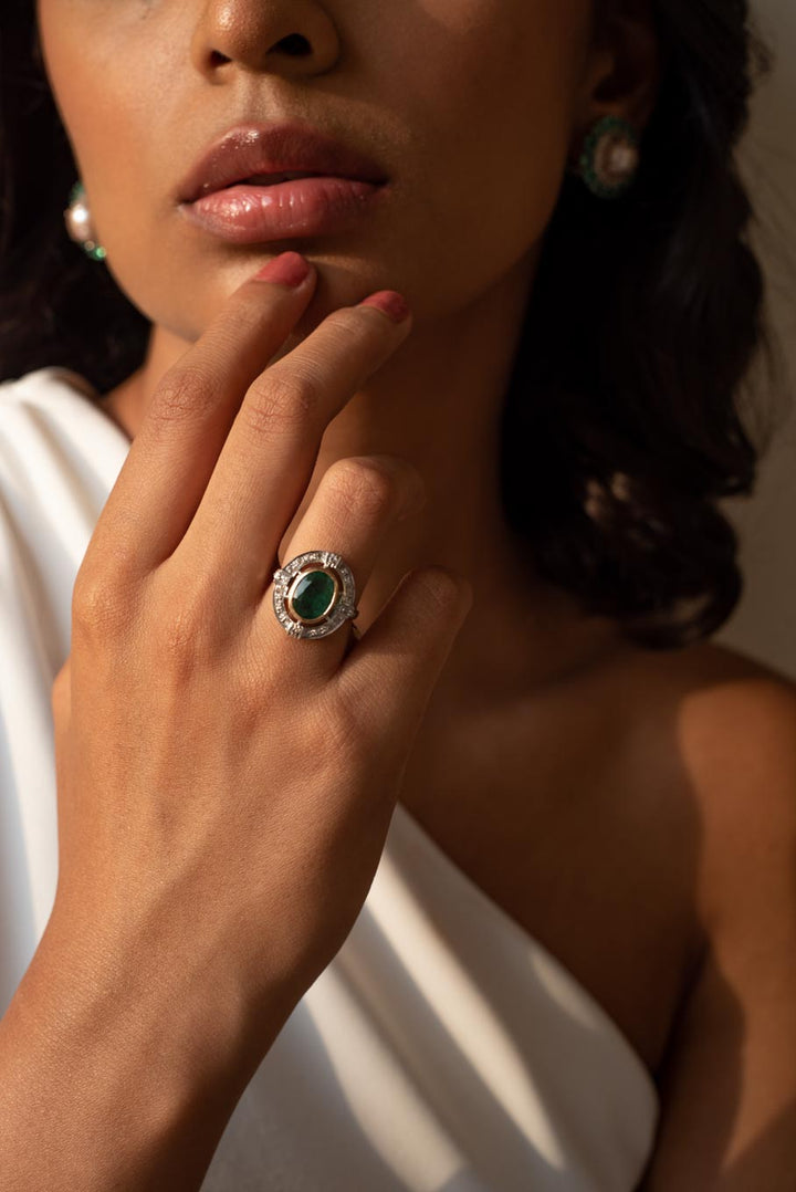 14K gold Green Tamara Ring oval emerald worn on finger