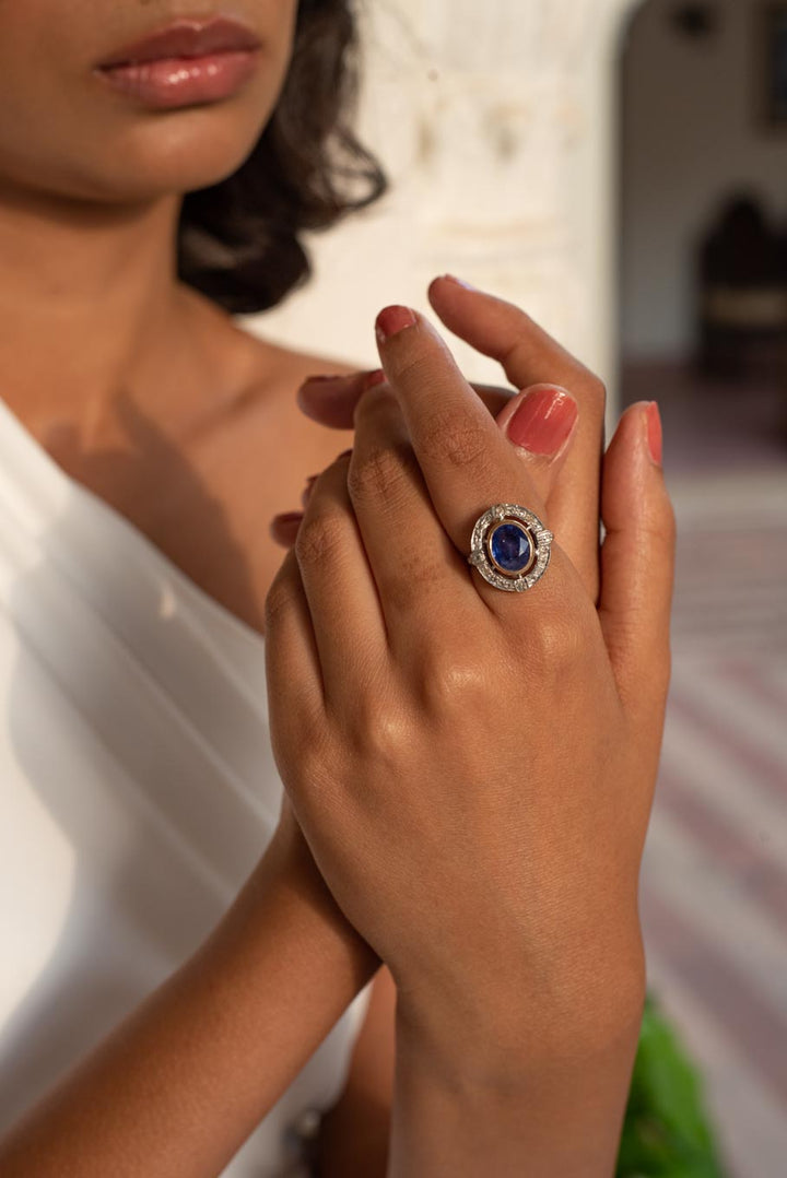 14K gold Art Deco blue sapphire ring worn on hand