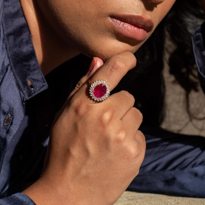 14K gold Rabia Ring with large oval ruby and diamond filigree