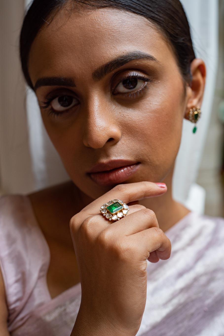 14K gold rectangular emerald ring with diamond accents
