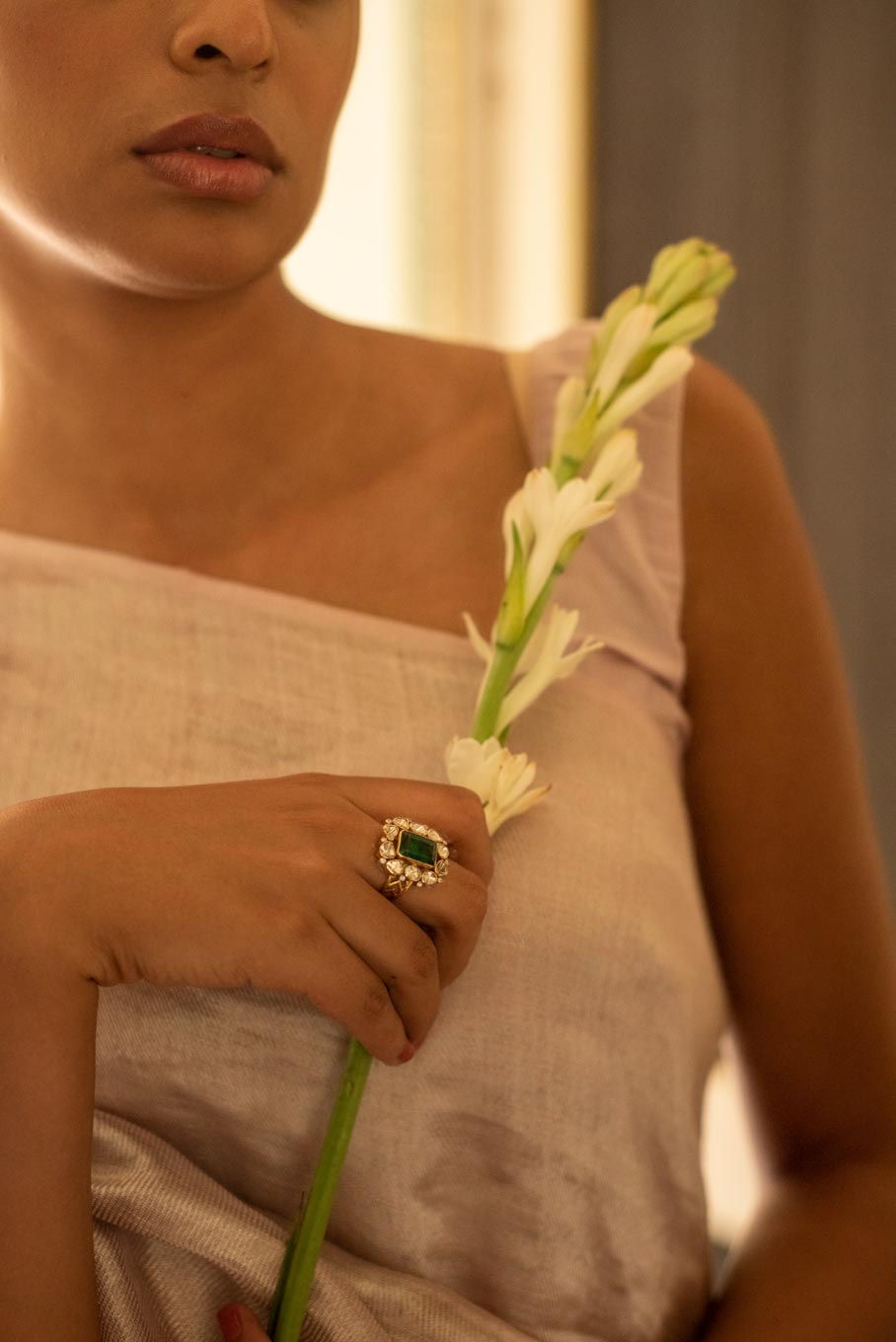 14K gold emerald ring intricate detailing on finger