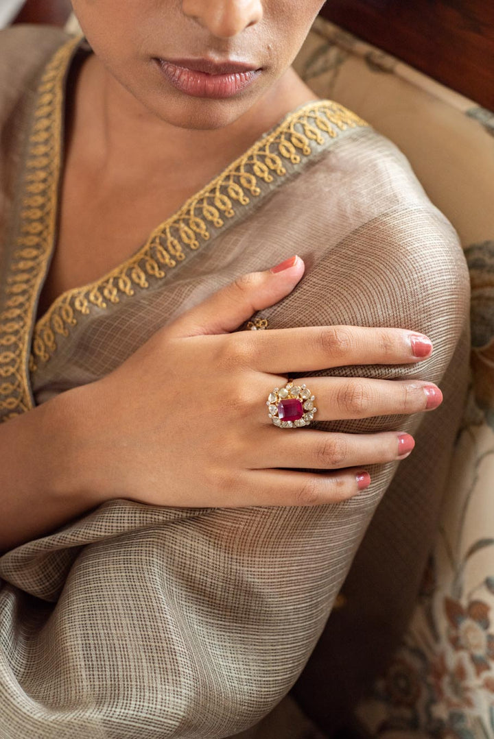 14K gold ruby diamond polki ring worn with beige saree