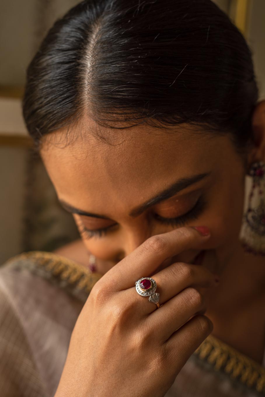 14K gold ruby ring worn with traditional Indian attire