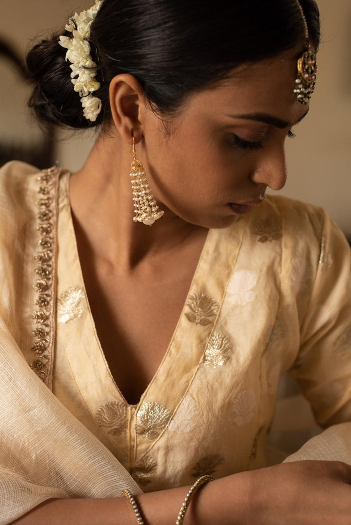 18K gold pearl-studded jhumka earrings with filigree detailing