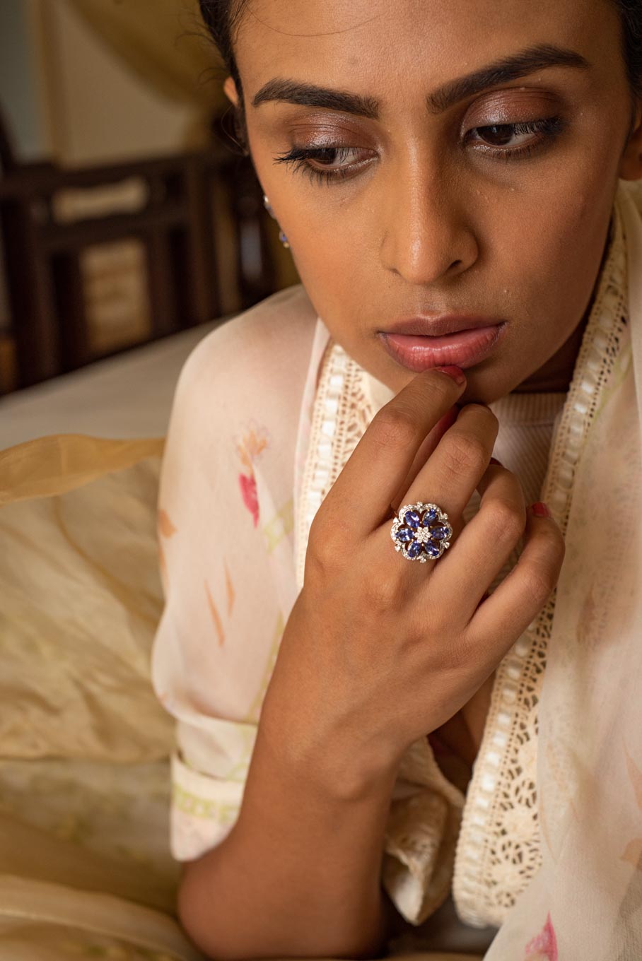925 silver tanzanite floral ring with diamond center detail
