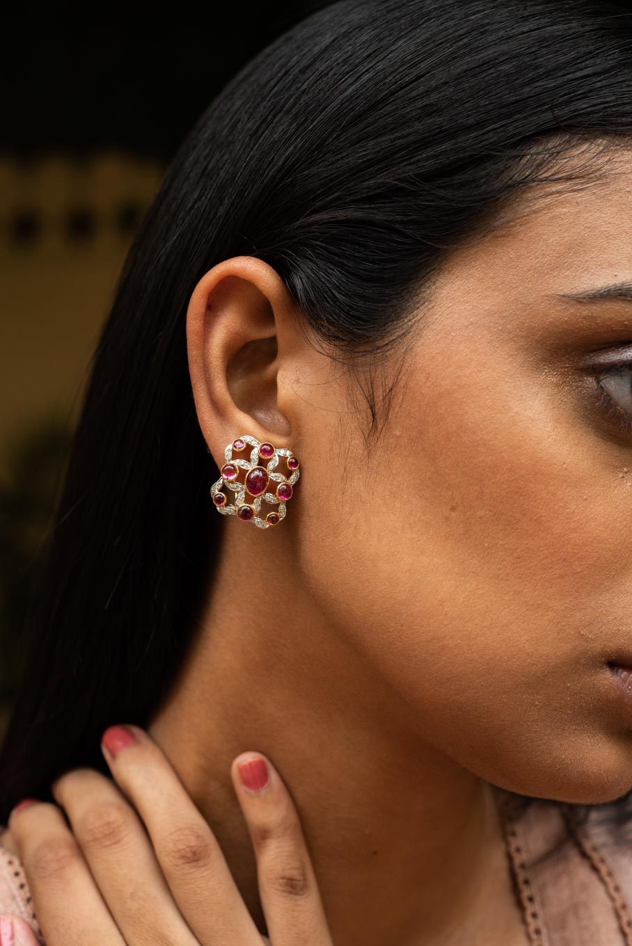 14K gold tourmaline floral earring with red gemstone accents