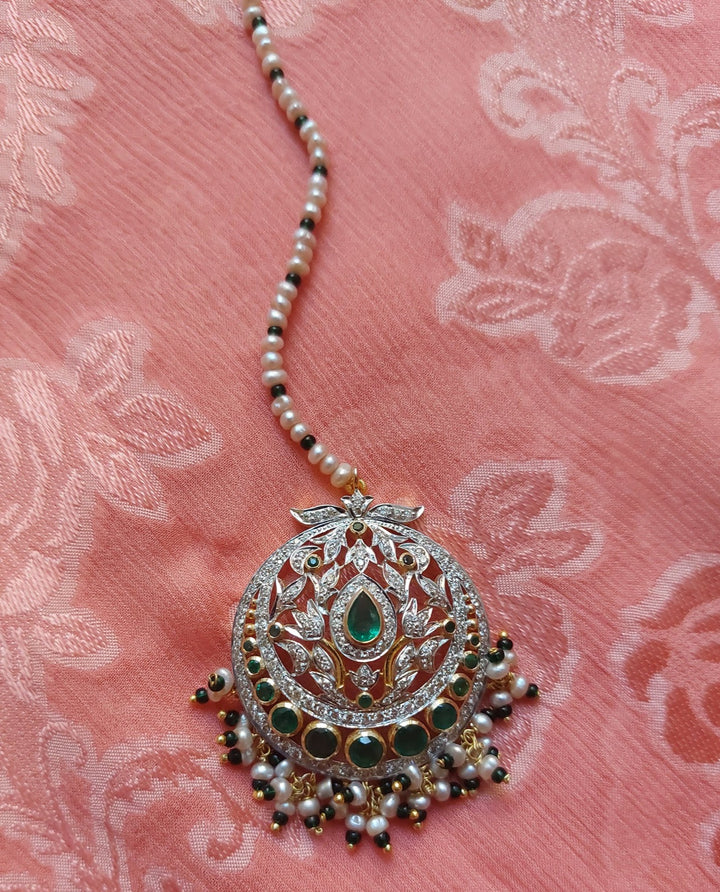 18K gold Noor Emerald Tika with green emerald and pearl accents