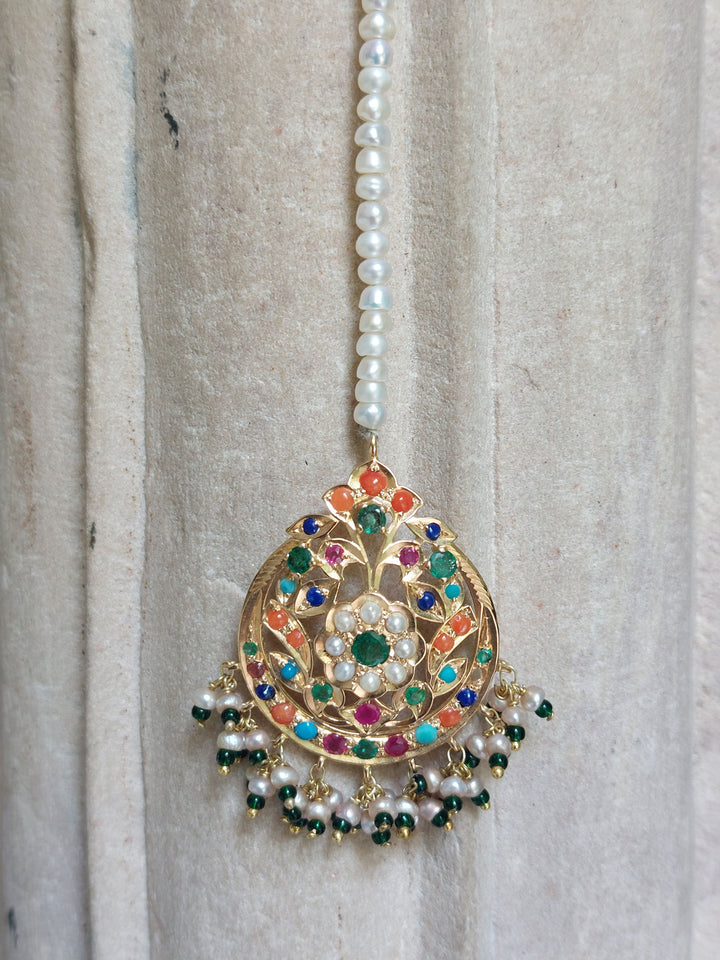 18K gold Sahiba Navrattan Tika with multicolored gemstones