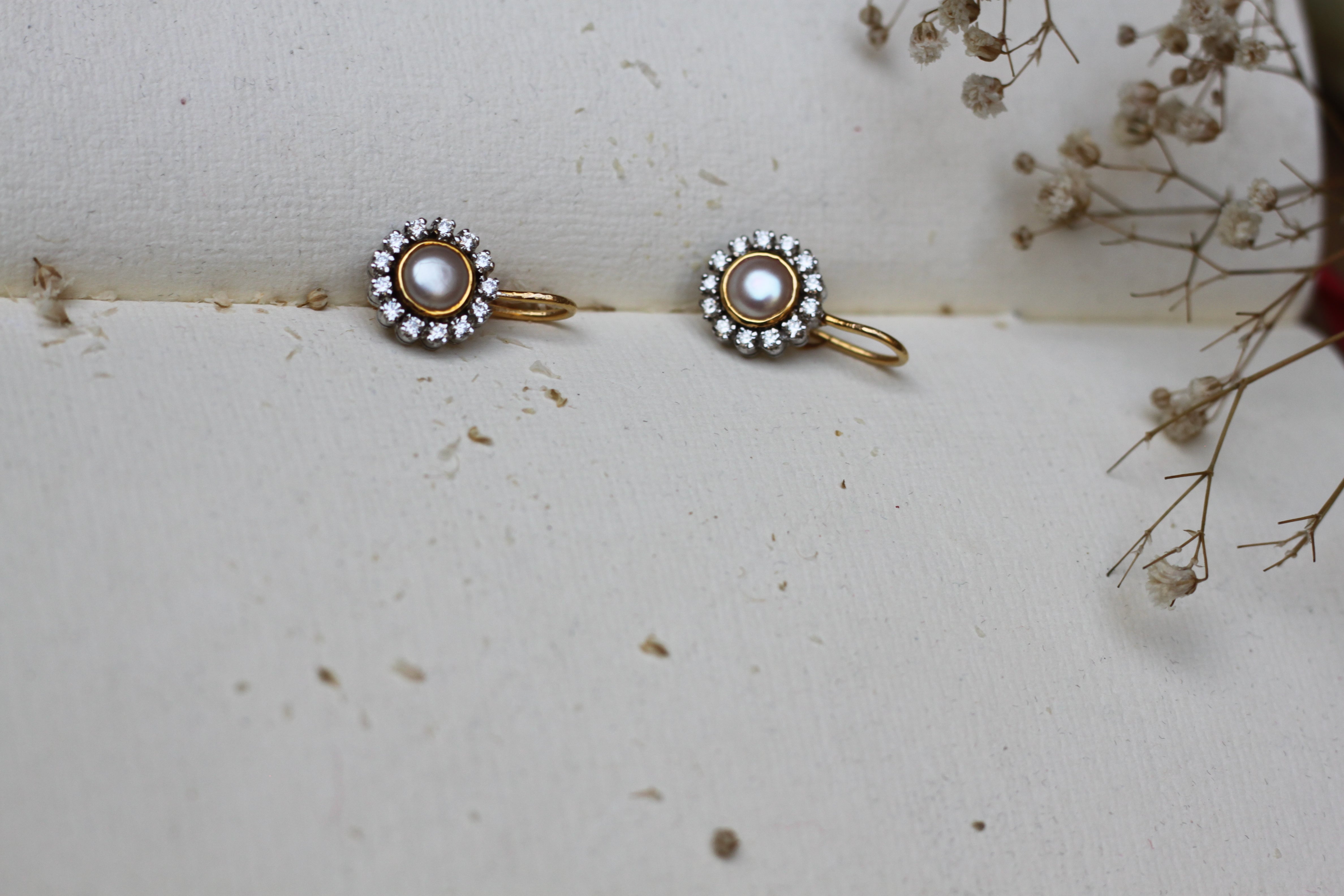 14K gold pearl earrings circular diamond design