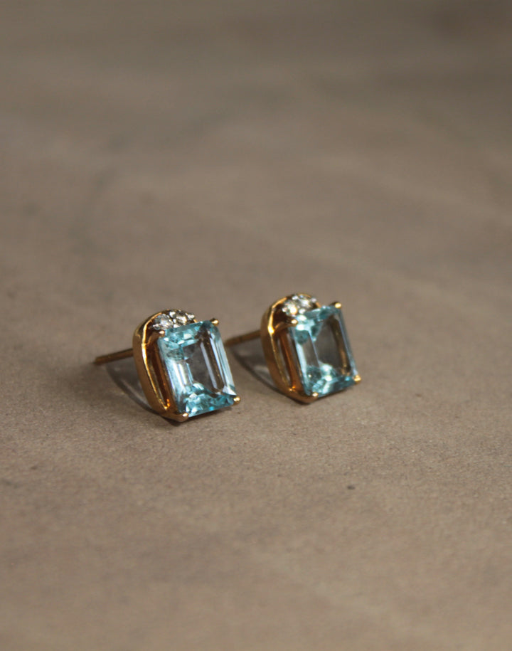 14K gold blue topaz stud earrings rectangular cut