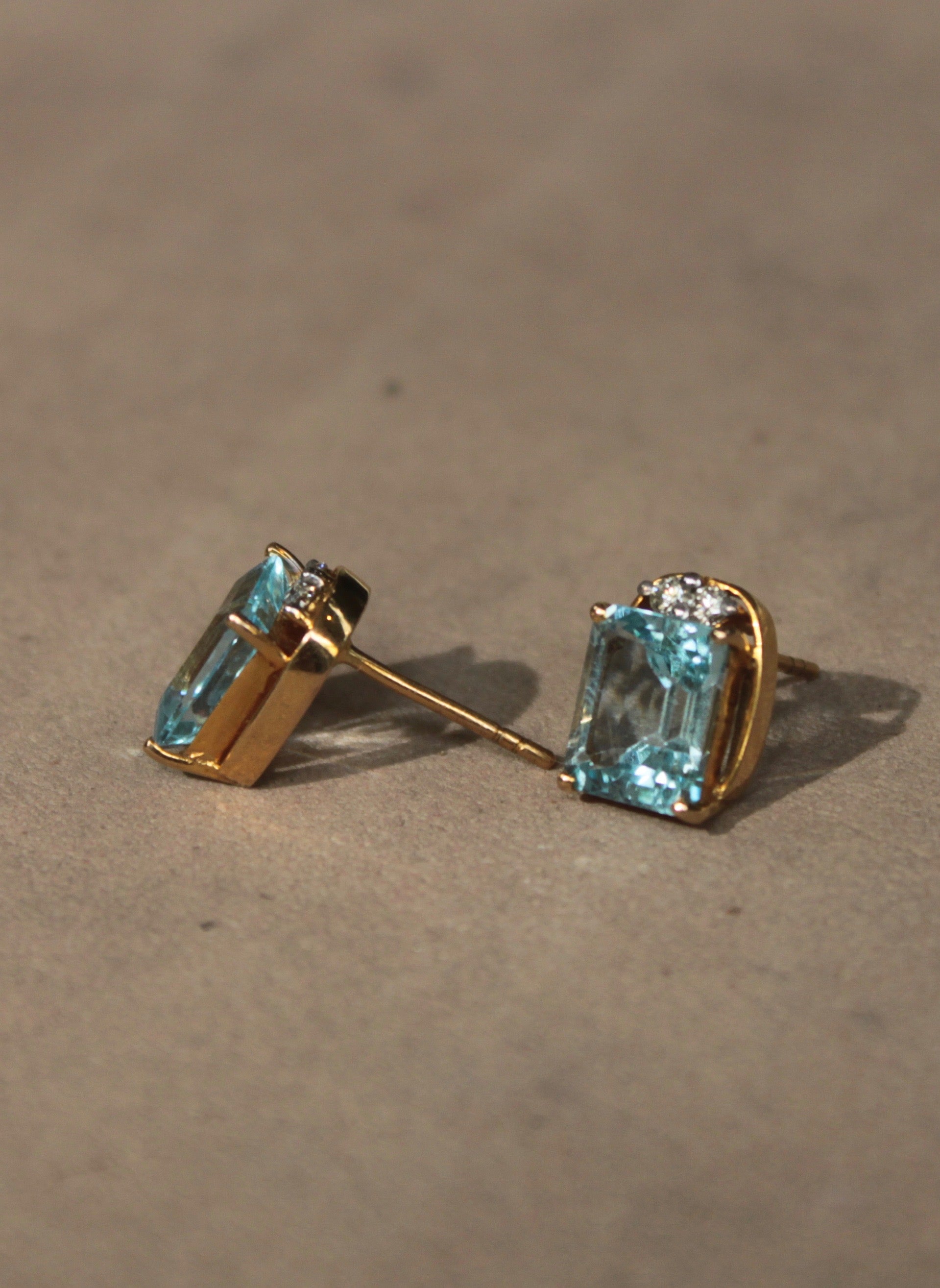 14K gold blue topaz stud earrings Contemporary Collection