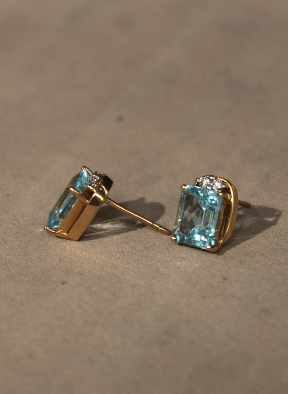 14K gold blue topaz stud earrings Contemporary Collection
