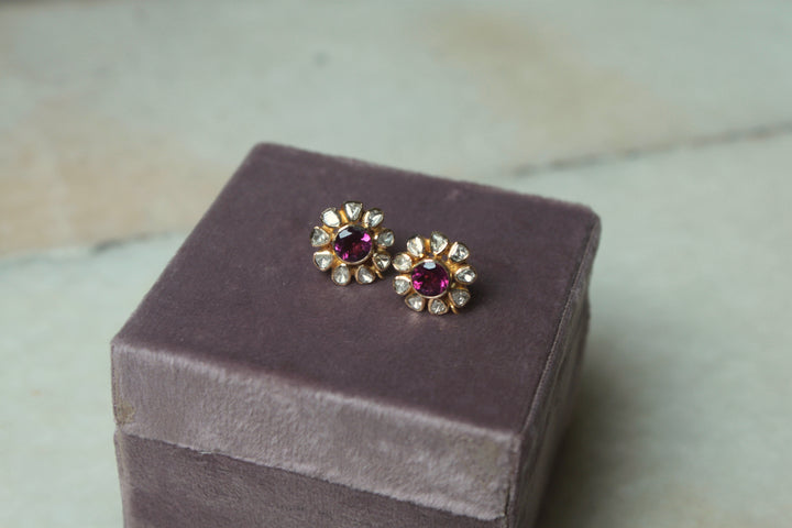 14K gold polki earrings with ruby center stones in display box