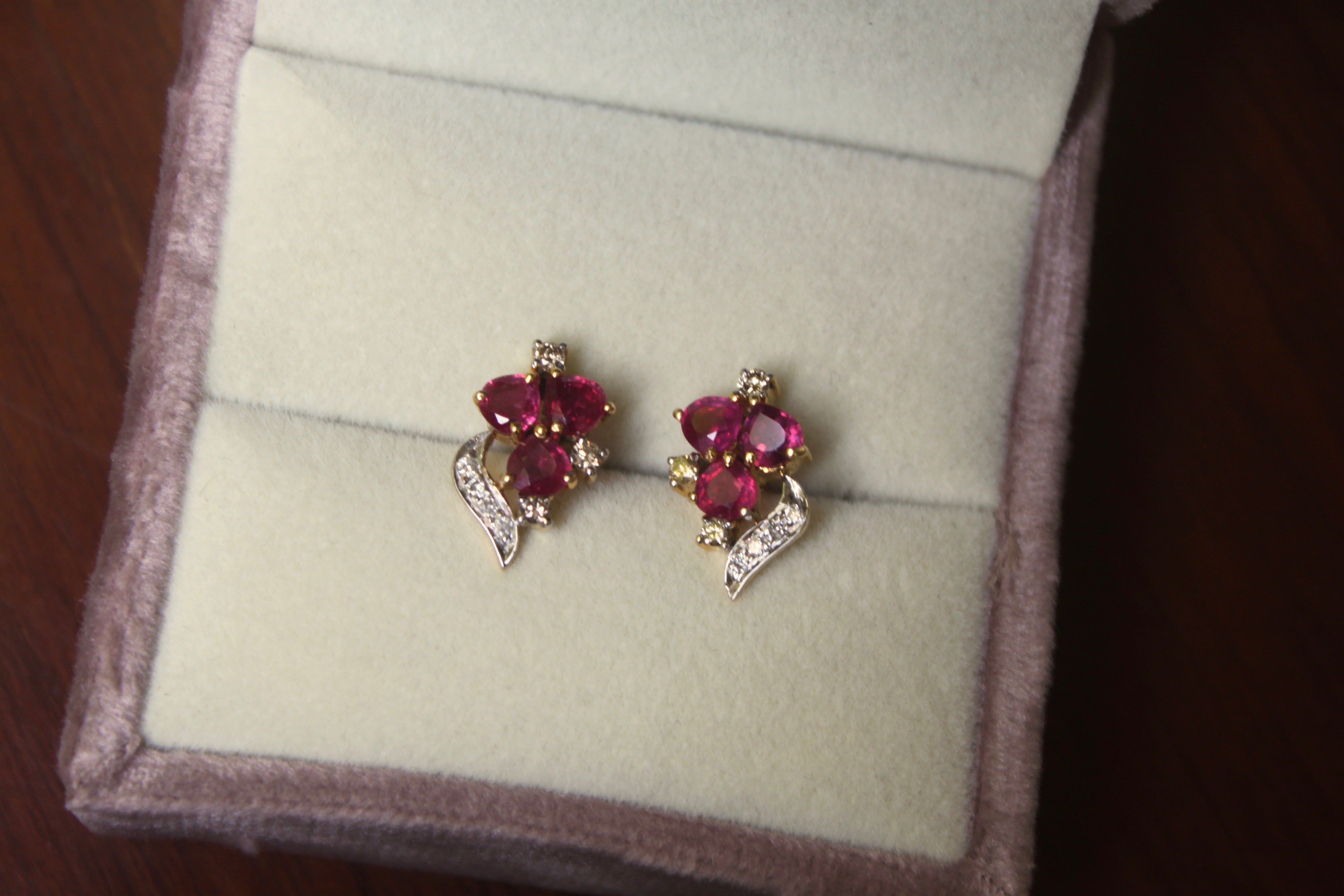 14K gold ruby stud earrings floral design with diamonds
