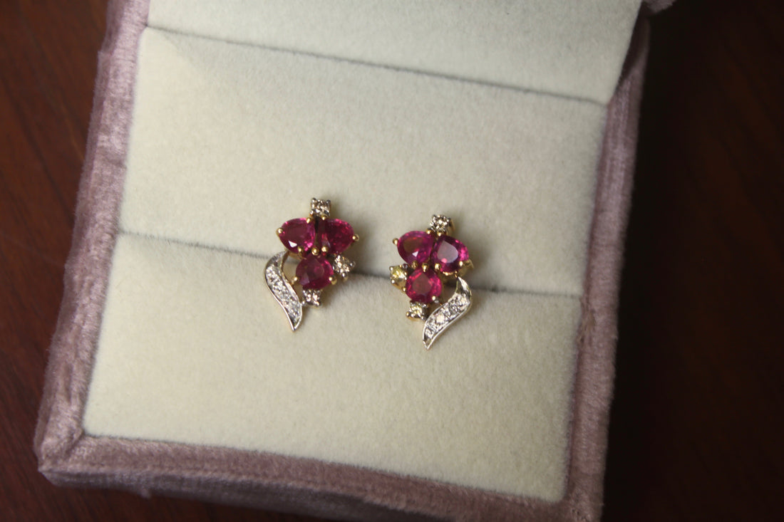 14K gold ruby stud earrings floral design with diamonds
