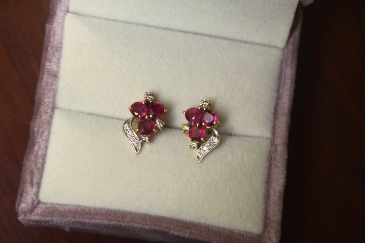 14K gold ruby stud earrings floral design with diamonds