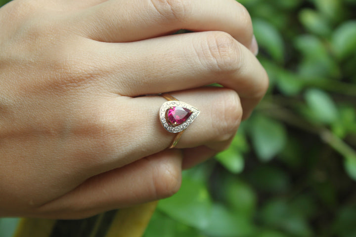 14K gold rubellite ring pear-shaped gemstone with diamond halo