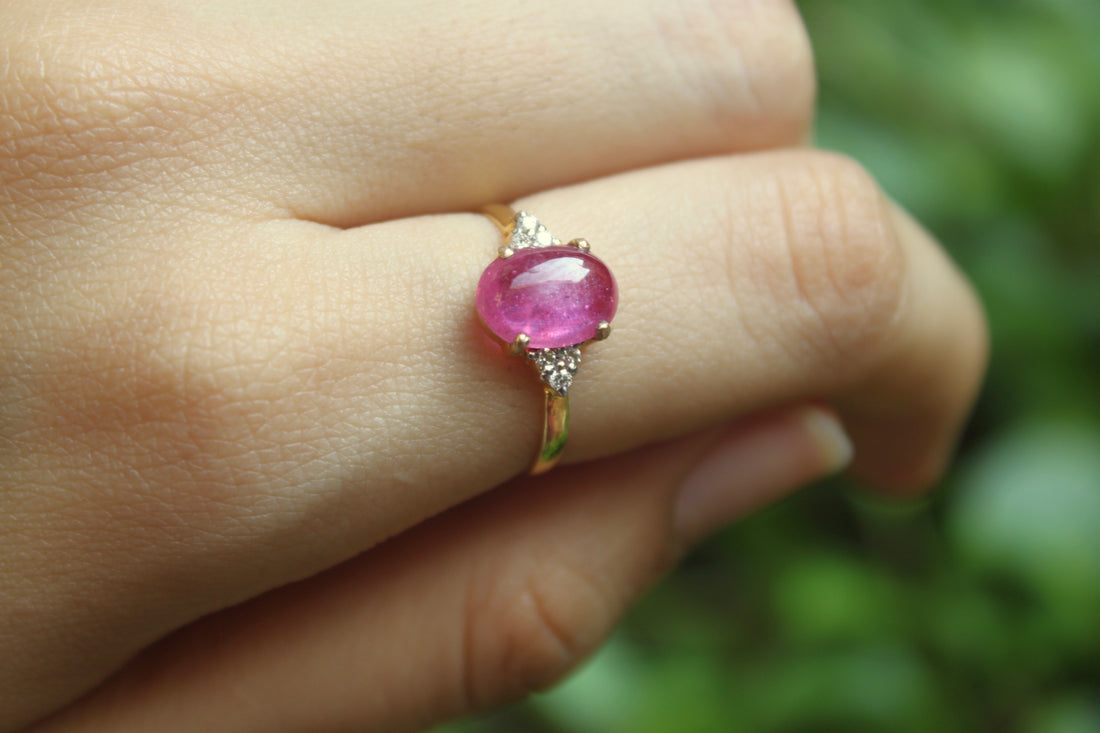 14K gold Nadeen Ring with oval ruby centerpiece on slender band